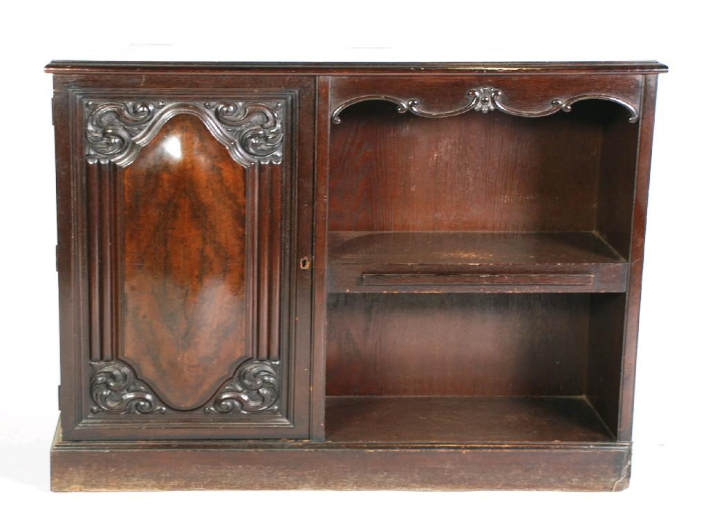 Appraisal: CONTINENTAL OAK DWARF CABINET with two open shelves and central