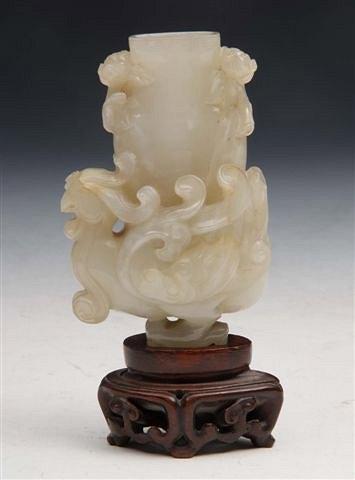 Appraisal: AN TH CENTURY CHINESE PALE JADE VASE carved as a