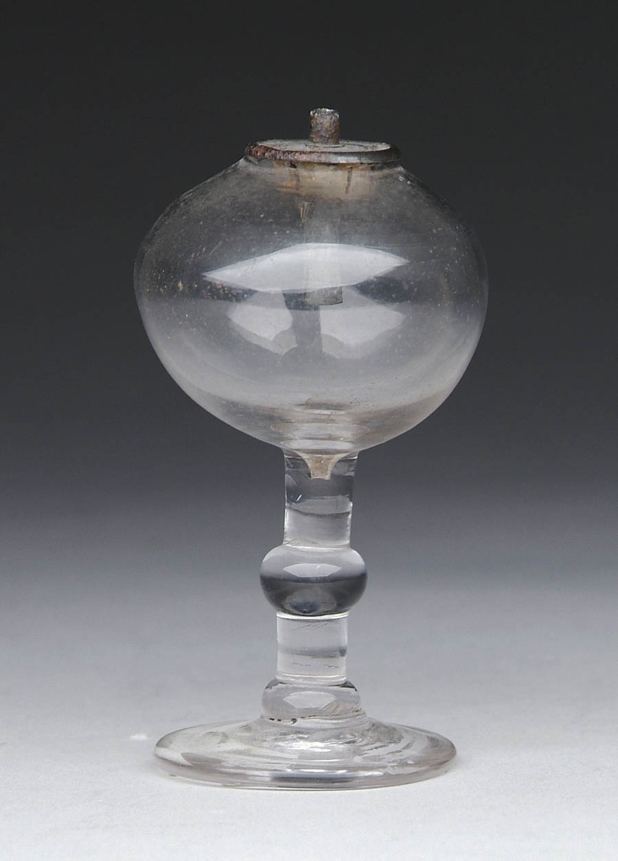 Appraisal: SMALL BLOWN GLASS SPARKING LAMP Round base has a knob