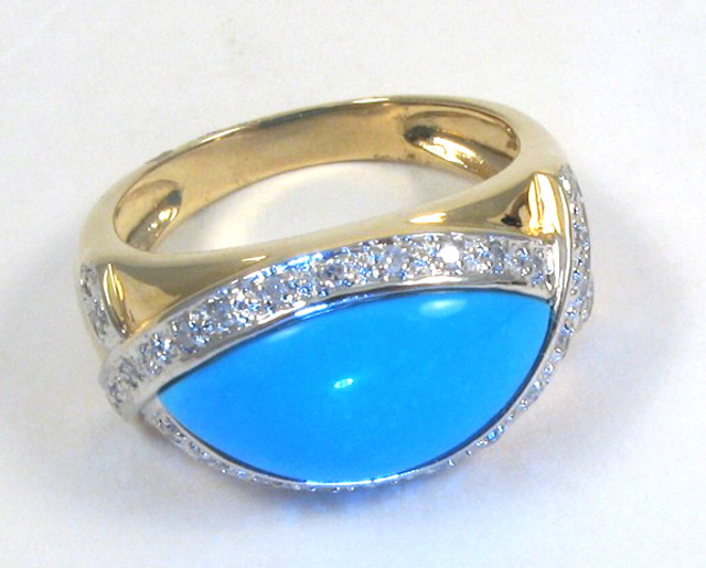 Appraisal: TURQUOISE AND FOURTEEN KARAT GOLD RING The yellow and white