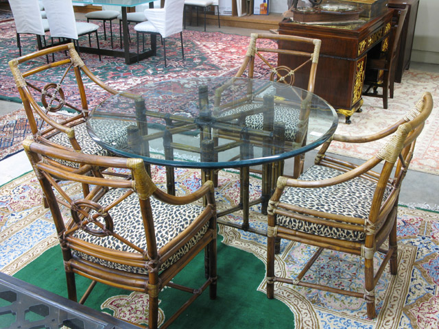 Appraisal: CONTEMPORARY BAMBOO AND RATTAN DINING TABLE AND CHAIR SET McGuire