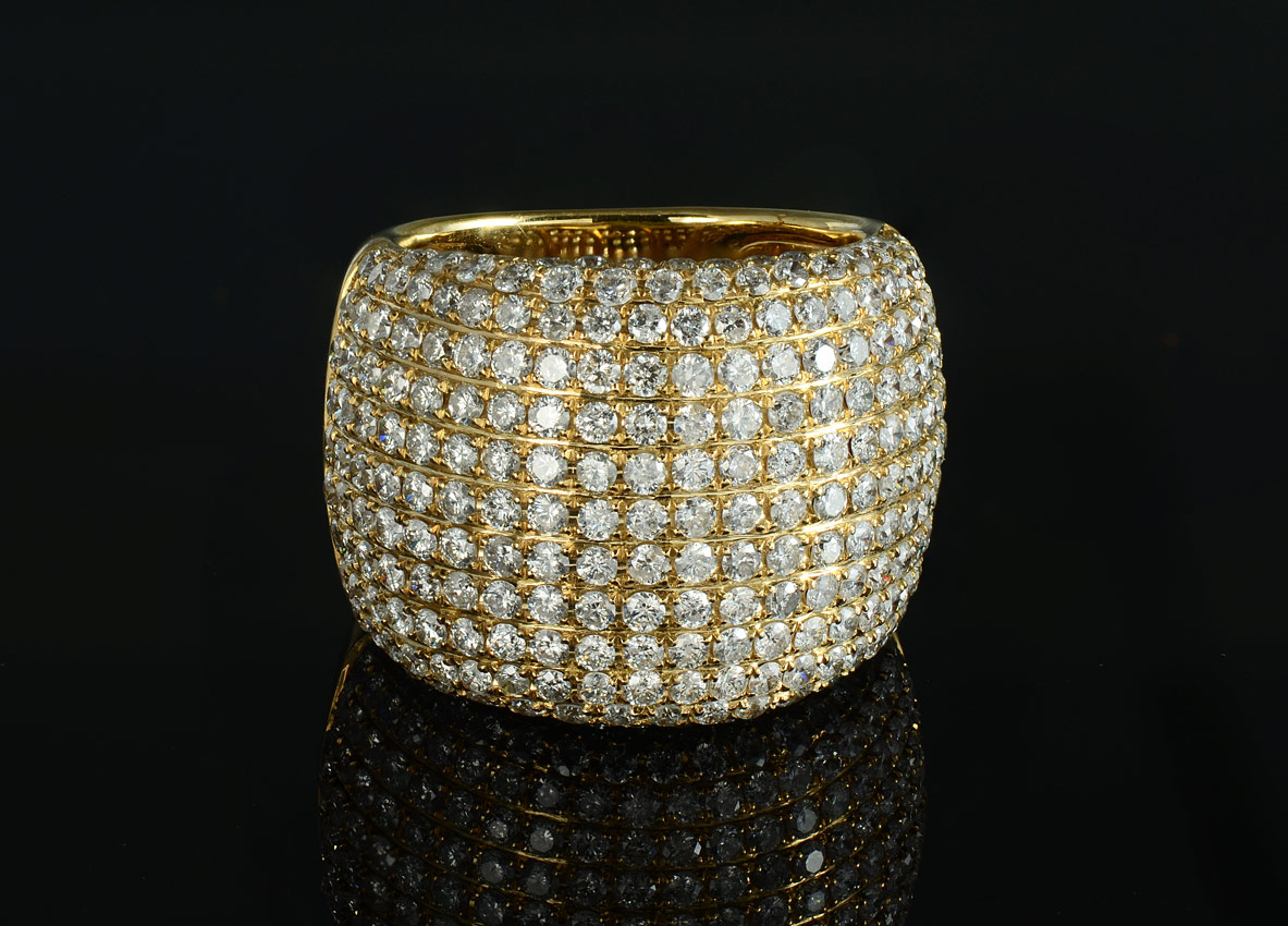 Appraisal: K PAVE DIAMOND RING A wide K yellow gold ring