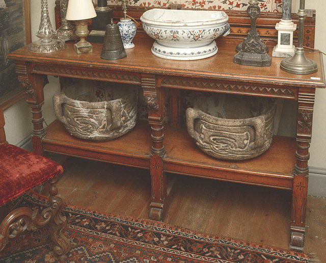 Appraisal: A VICTORIAN OAK SIDE TABLE in the manner of Bruce