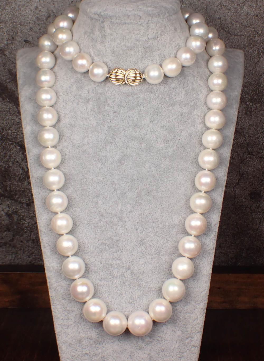 Appraisal: SOUTH SEA PEARL AND EIGHTEEN KARAT GOLD NECKLACE - hand-knotted