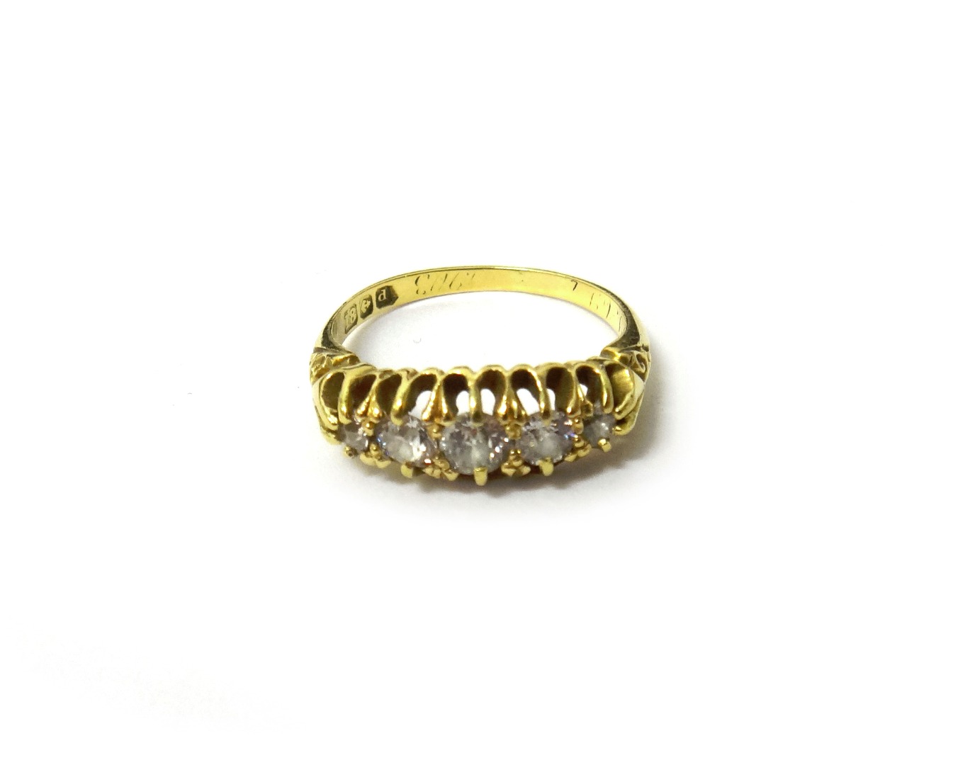 Appraisal: An ct gold and diamond five stone ring mounted with