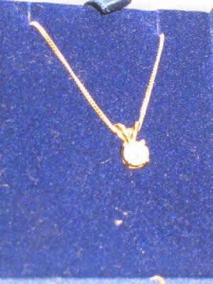 Appraisal: A SINGLE DIAMOND PENDANT in yellow gold with ct gold