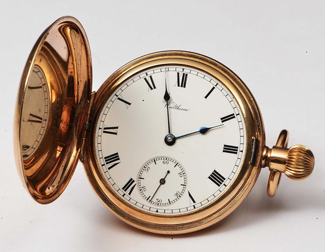 Appraisal: A GOLD PLATED HUNTER POCKET WATCH with top wind mechanism