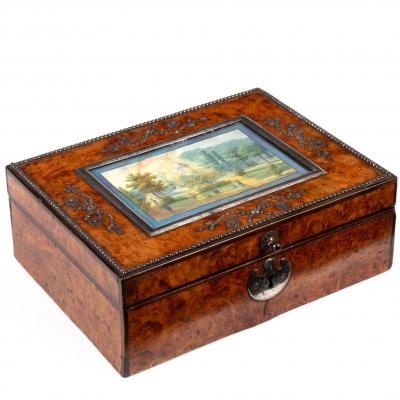 Appraisal: A Regency burr walnut workbox the lid set with a