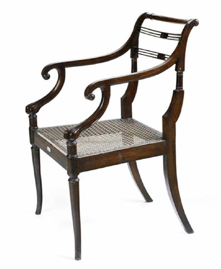 Appraisal: A Regency simulated mahogany open armchair after a design by