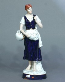 Appraisal: A Royal Dux figure of a girl