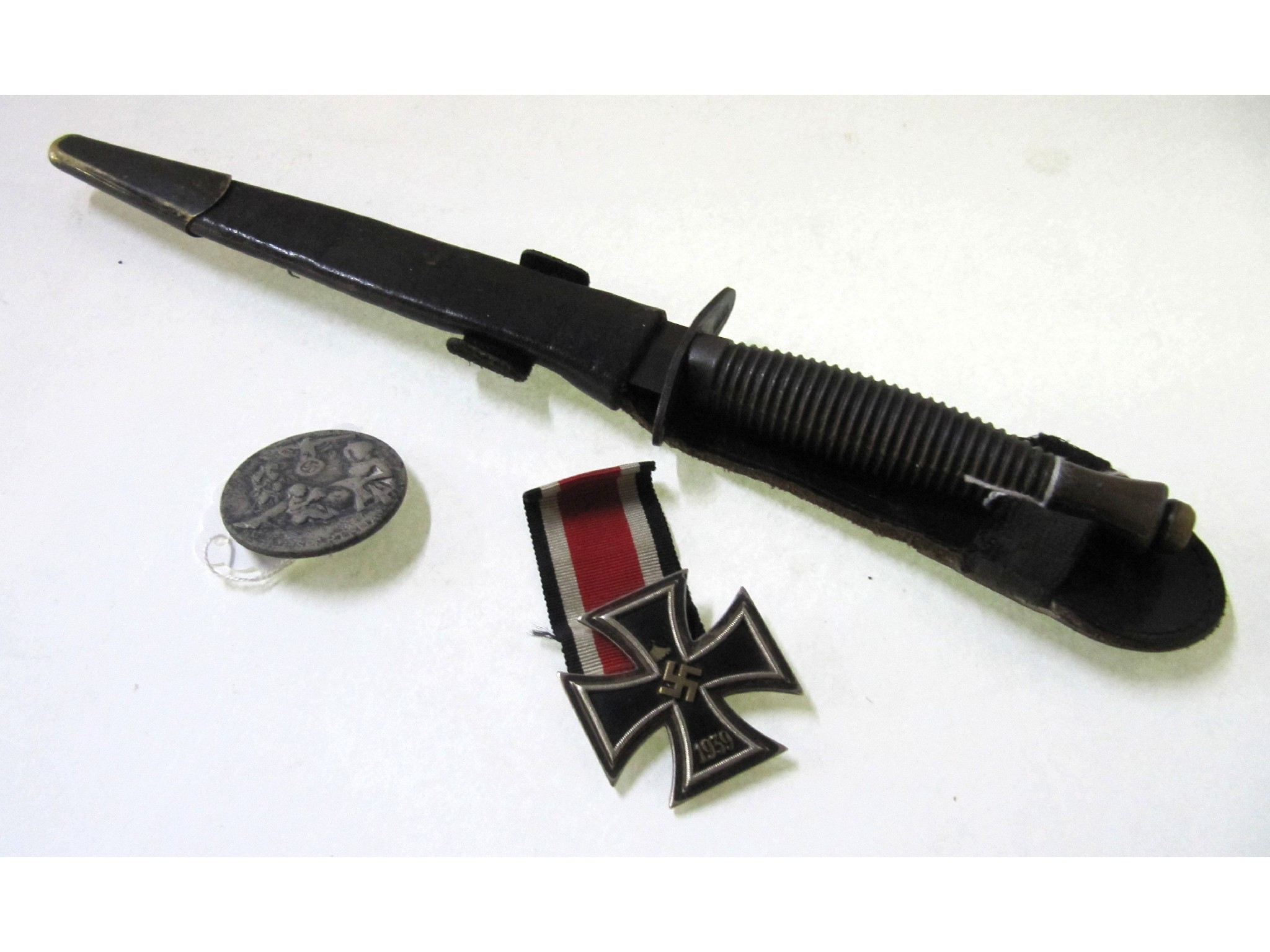 Appraisal: A lot comprising a Commando dagger an iron cross and