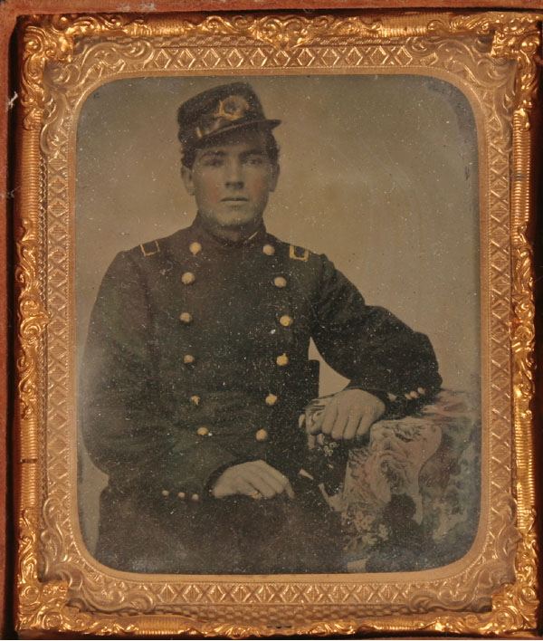 Appraisal: Daguerreotype depicting a Civil War soldier tinted hues in ornate