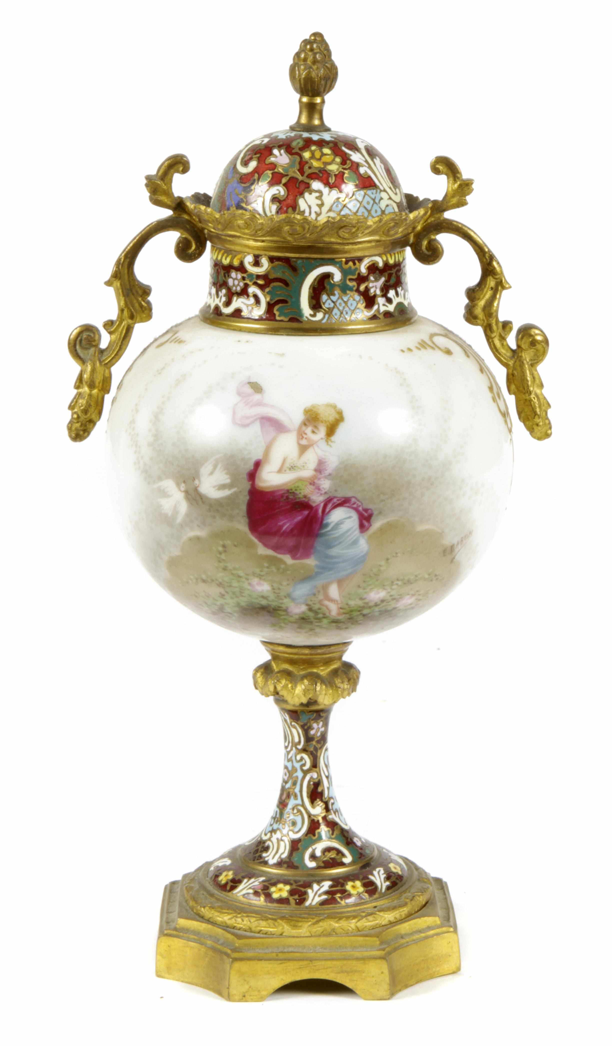 Appraisal: A French gilt bronze and champleve enamel mounted porcelain urn