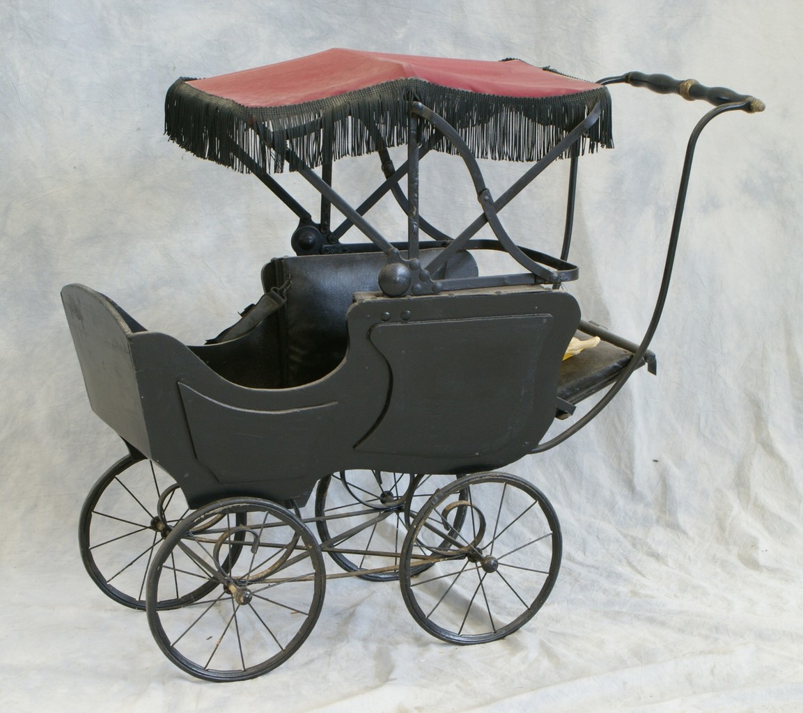 Appraisal: Wood and Metal Doll Carriage with reclining bed and retractable