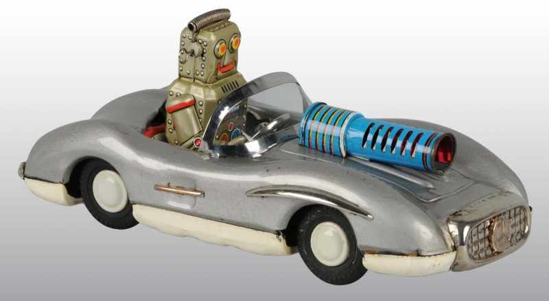 Appraisal: Tin Robot Driving Mercedes Friction Toy Description Japanese Working Ray