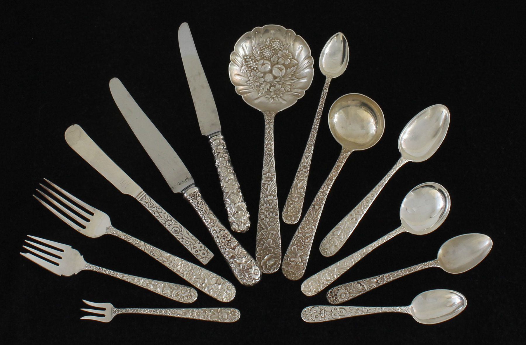 Appraisal: A quantity of American silver flatware with florally chased handles