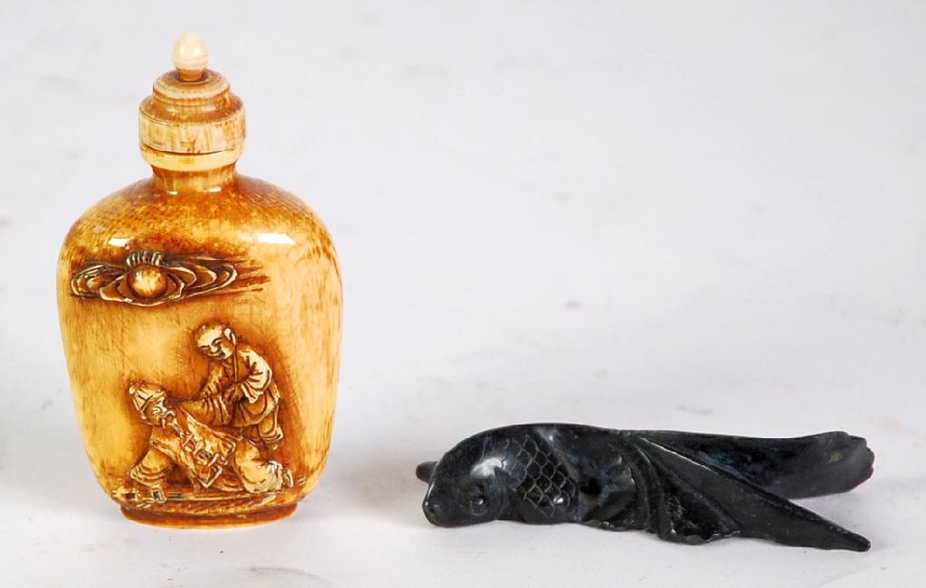 Appraisal: ORIENTAL CARVED IVORY SNUFF BOTTLE together with a soapstone NETSUKE