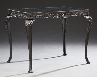 Appraisal: Wrought Iron Patio Table th c the inset glass top