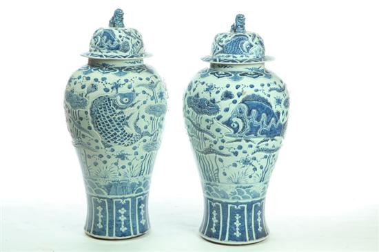 Appraisal: PAIR OF LARGE COVERED URNS China late th century Impressive