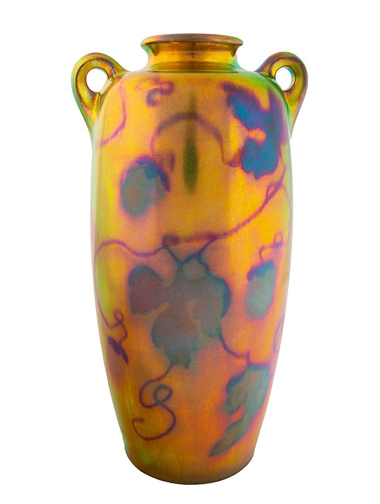 Appraisal: A HUNGARIAN EOSIN-GLAZED TWO-HANDLED 'GRAPE LEAF' VASE ZSOLNAY PORCELAIN FACTORY