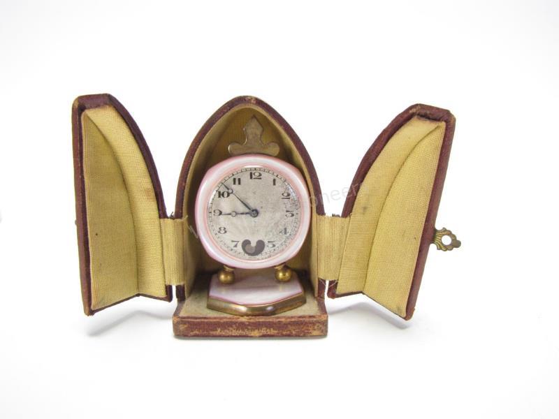 Appraisal: Antique Swiss Miniature Dresser Clock in pocket watch form mother