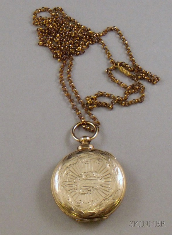 Appraisal: Victorian Engraved Gilt-metal Pocket Watch-form Locket on Chain the interior