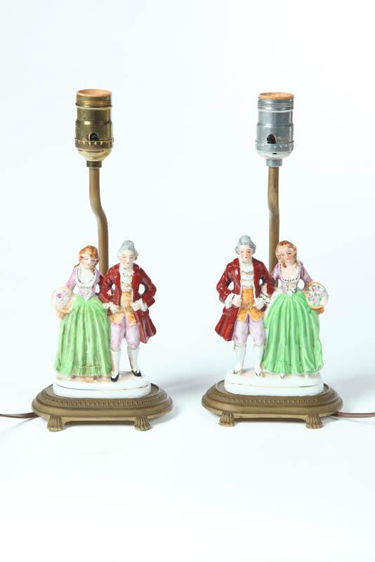 Appraisal: PAIR OF TABLE LAMPS American th century Porcelain colonial couples