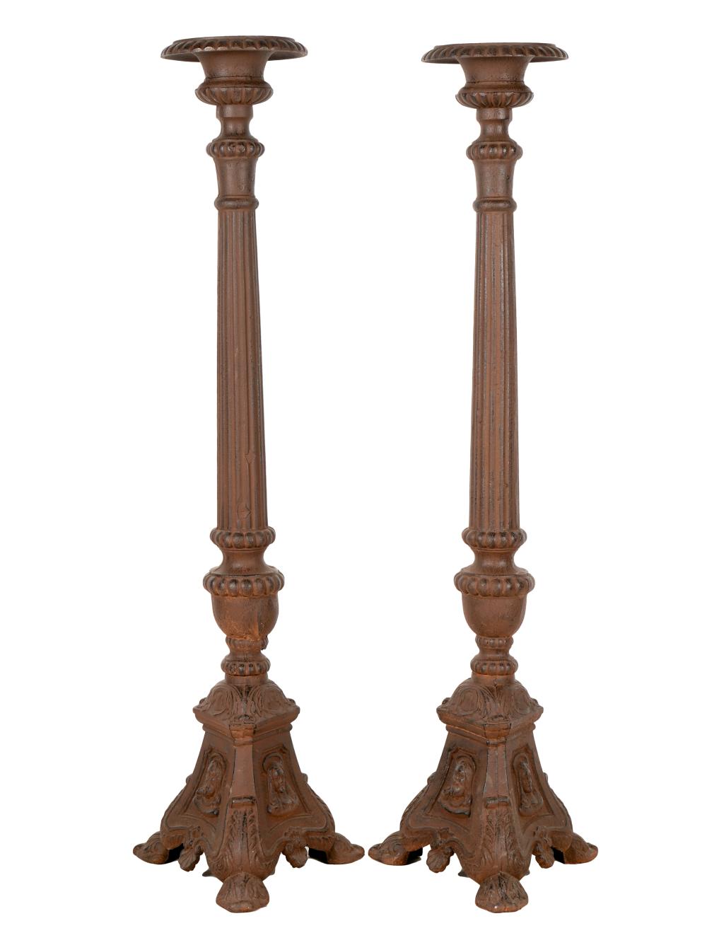 Appraisal: PAIR OF NEOCLASSICAL CAST IRON CANDLE STANDSeach urn-form platform on