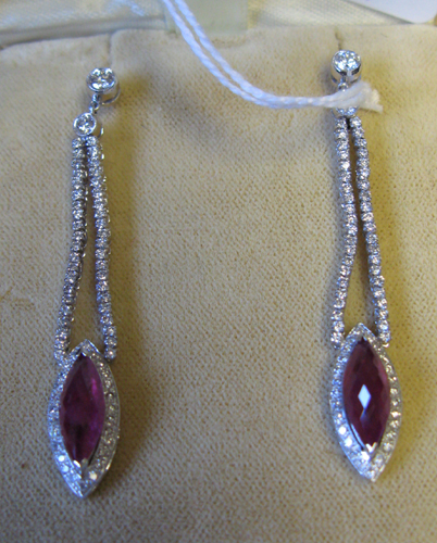 Appraisal: RUBY DIAMOND AND EIGHTEEN KARAT GOLD PENDANT EARRINGS each set