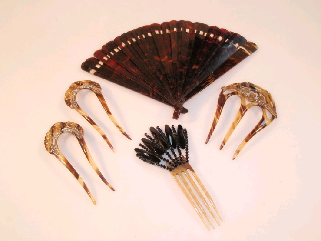 Appraisal: A tortoiseshell effect ladies fan together with four tortoiseshell effect