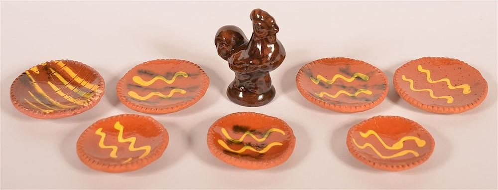 Appraisal: Breininger Redware Miniature Plates Rooster Early s Breininger Redware MiniatureSlip