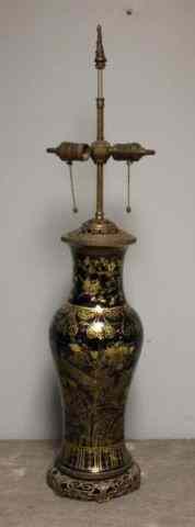 Appraisal: Antique Chinese ''Mirror Black'' Porcelain Urn withGilded Decoration Mounted with