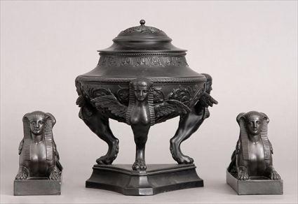 Appraisal: WEDGWOOD BASALTES THREE-PIECE GARNITURE Impressed Wedgwood comprising a tripod censor