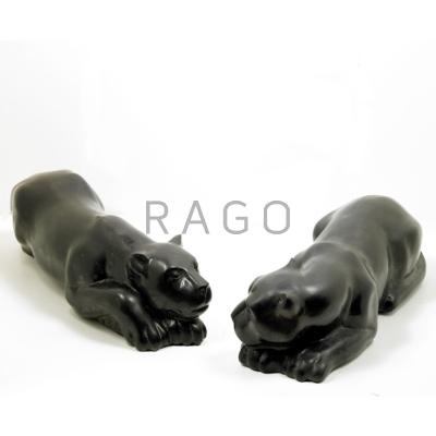 Appraisal: LIONESS SCULPTURES th c Pair in black marble of lioness