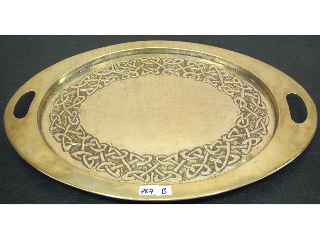 Appraisal: Arts and Crafts brass oval serving tray decorated with Celtic