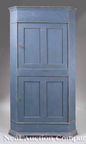 Appraisal: An English Painted Pine Corner Cupboard th c the molded