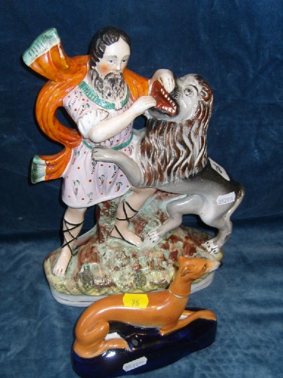 Appraisal: A th century Staffordshire flat back group The Lion Tamer