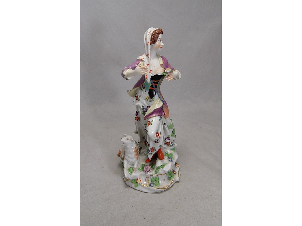 Appraisal: German porcelain figure of a young woman on a naturalistic