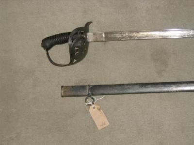 Appraisal: AN IMPERIAL GERMAN OFFICERS SWORD with basket hilt incorporating spread