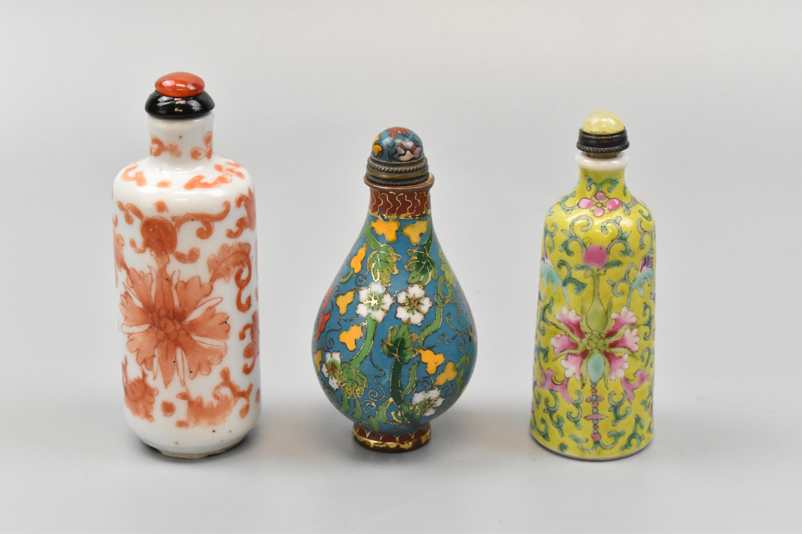 Appraisal: Three Chinese snuff bottles two porcelain and cloisonne dating from