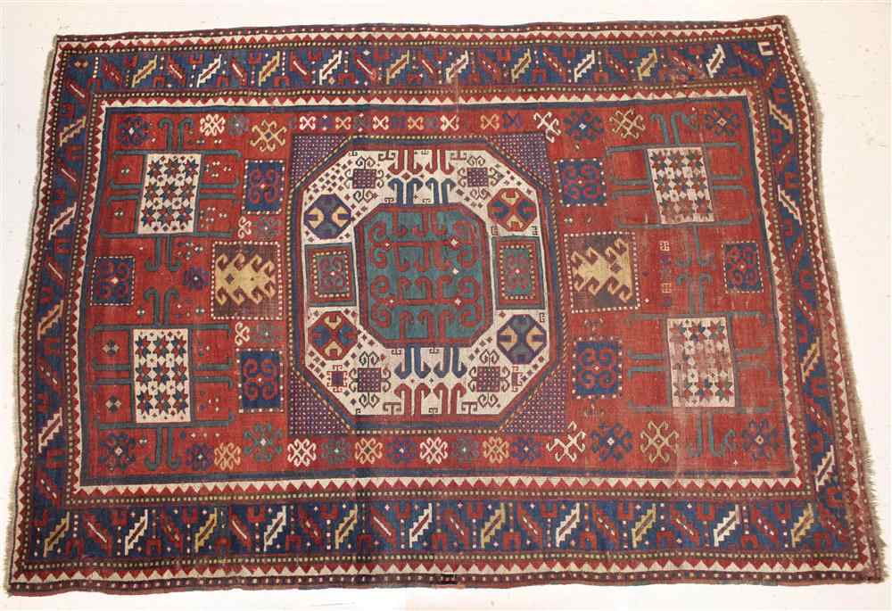 Appraisal: ANTIQUE KARATCHOPH KAZAK CARPET CAUCASUS red ground with blue navy