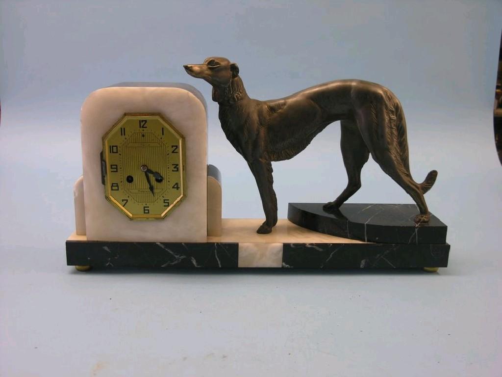 Appraisal: An Art Deco marble mantel clock cream and black marble