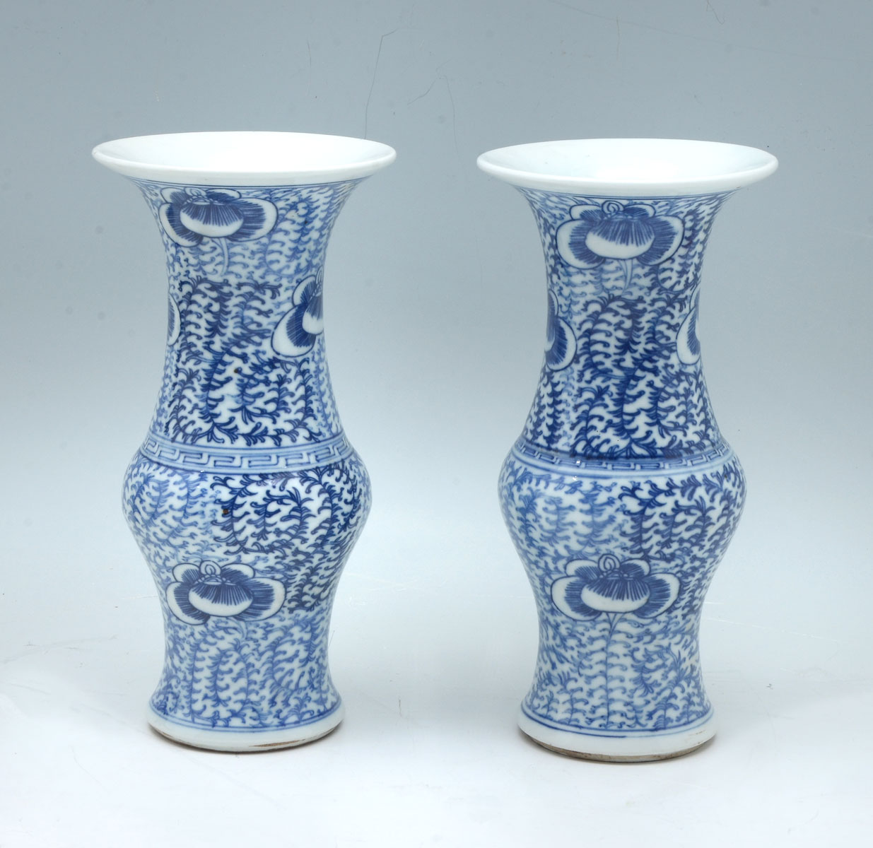 Appraisal: PAIR OF QING DYNASTY ''GU'' FORM EXPORT VASES Pair of