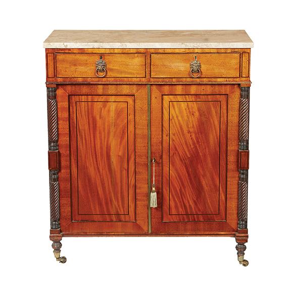 Appraisal: A REGENCY MAHOGANY MARBLE TOPPED SIDE CABINET CIRCA The overlaid