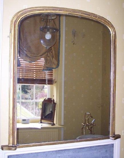 Appraisal: A Victorian overmantel mirror the arched plate in gilt moulded