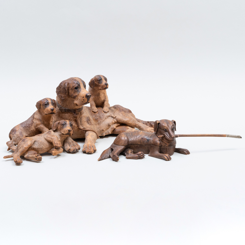 Appraisal: CARVED AND PAINTED WOOD MOM AND PUPPY GROUP AND A