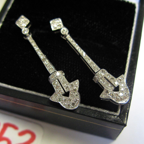 Appraisal: PAIR OF DIAMOND AND EIGHTEEN KARAT WHITE GOLD EARRINGS each