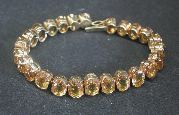 Appraisal: Vermeil and Citrine Link Bracelet composed of twenty-four oval-cut citrines