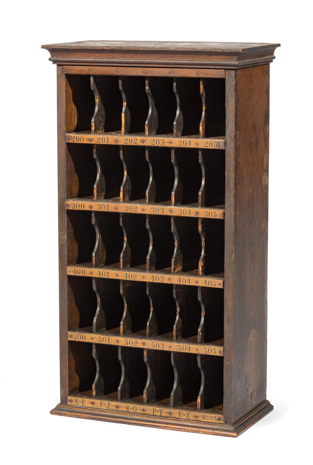 Appraisal: American Oak Postmaster Cabinet compartments headed by engraved celluloid numbers