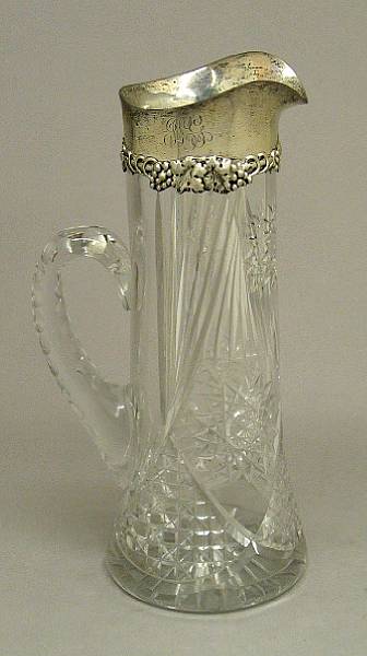 Appraisal: A cut glass claret pitcher with sterling collar mountJ F